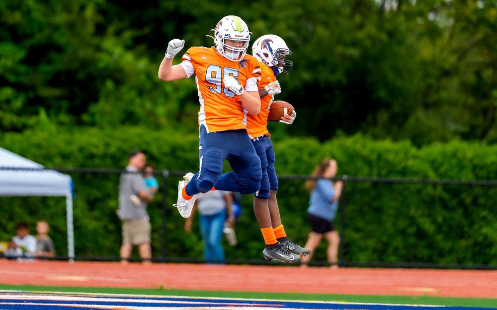 CFA Youth Football League team youth athletes touchdown celebration in Hershey PA, SportsFox Photography.