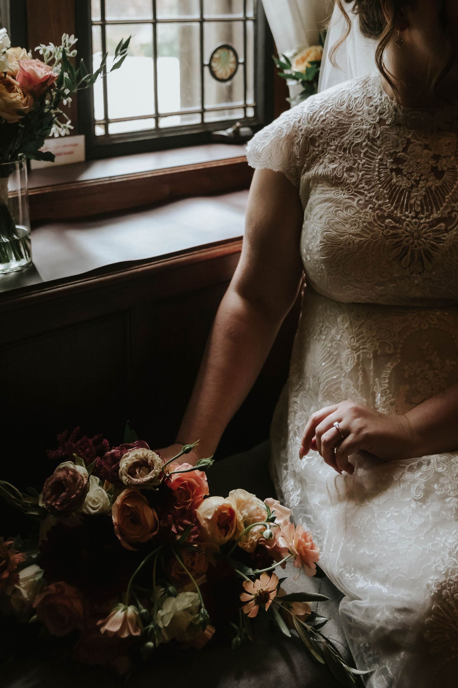 A romantic wedding photo with a flowing white dress in a scenic outdoor setting.