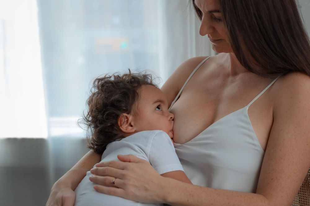Alberta.Calgary.Edmonton Wedding Photographer JRoyale Photography family session in-home session breastfeeding session
