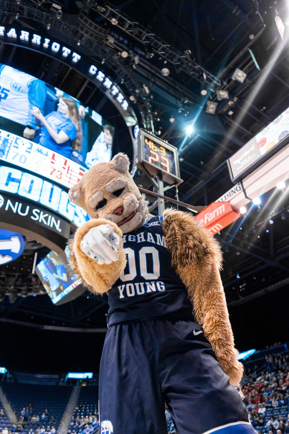 Cosmo Cougar pointing towards camera