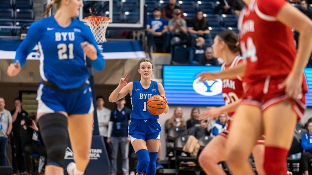 BYU Womens basketball player running back towards the camera