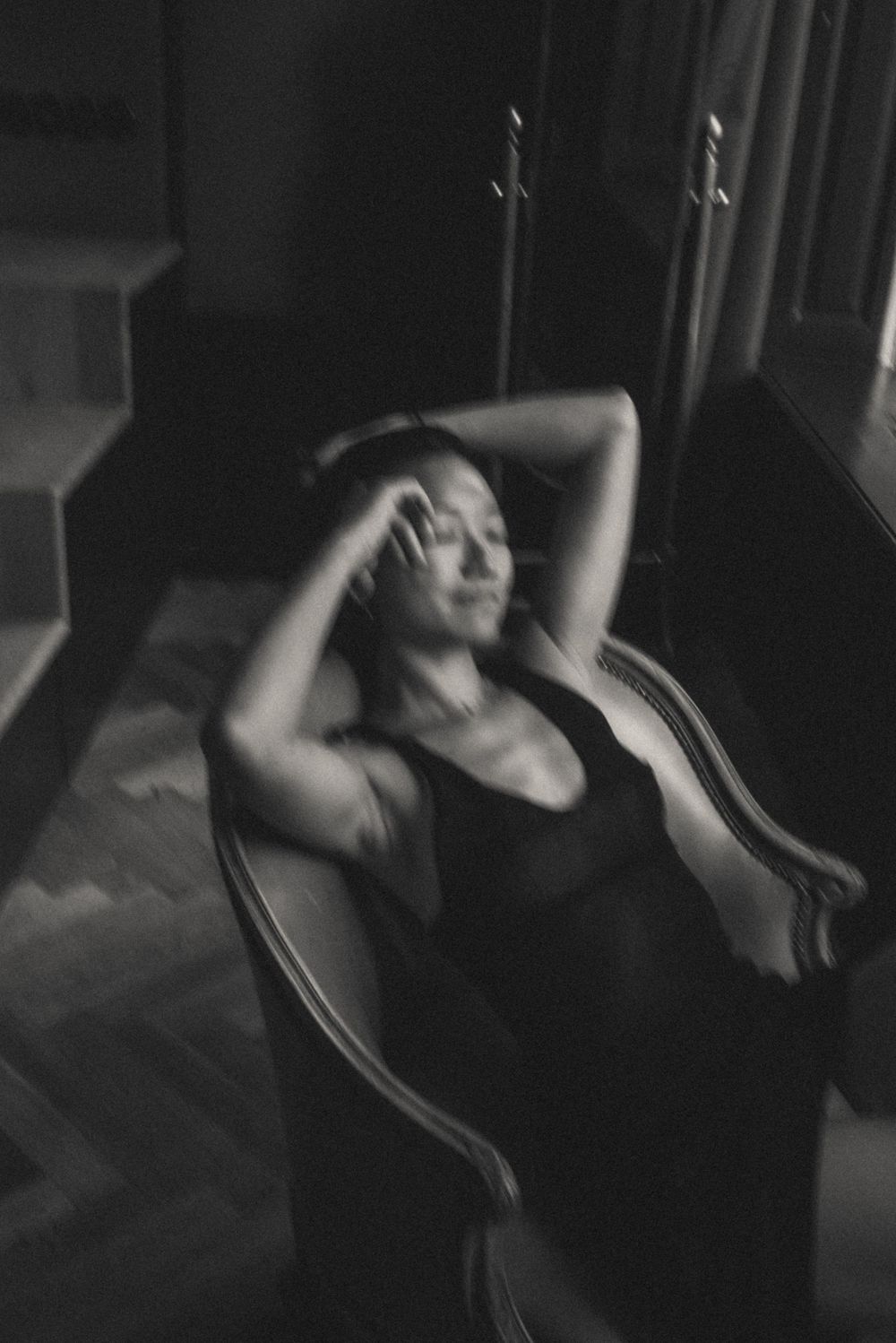 Dramatic black and white photo series showing movement and shadows on dark background.