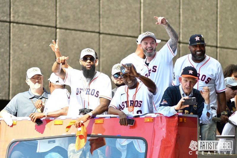 Houston Astros players celebrate on a parade float during their World Series victory celebration.