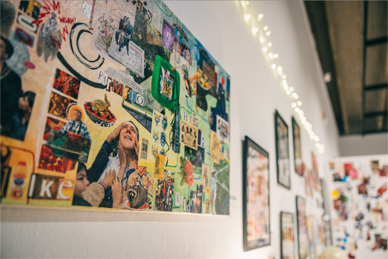 Mixed media collage featuring business mail and urban photography in a dark frame.