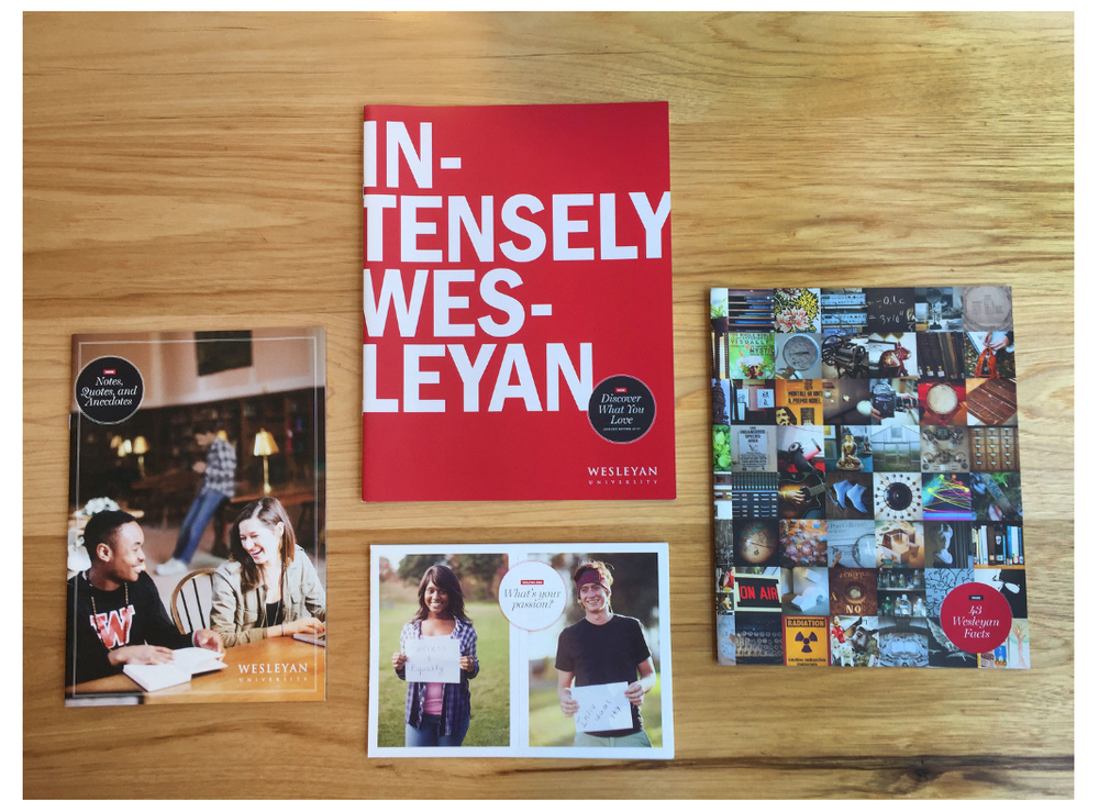 Four Wesleyan University publications spread on a wooden table, including the bold red IN-TENSELY WES-LEYAN booklet.
