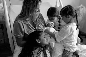 A black and white collage of candid moments showing people interacting in various casual settings.