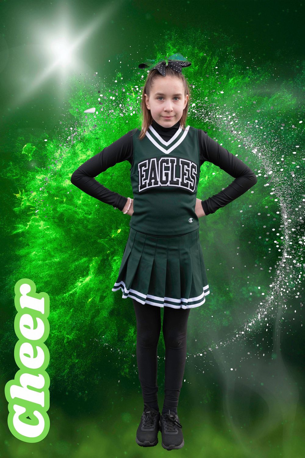 Young girl in green Eagles cheerleader uniform poses confidently against a vibrant green explosive background with cheer text.
