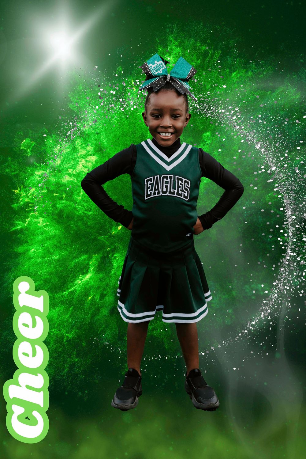 Young girl in green Eagles cheerleader uniform poses confidently with hands on hips against vibrant green background.