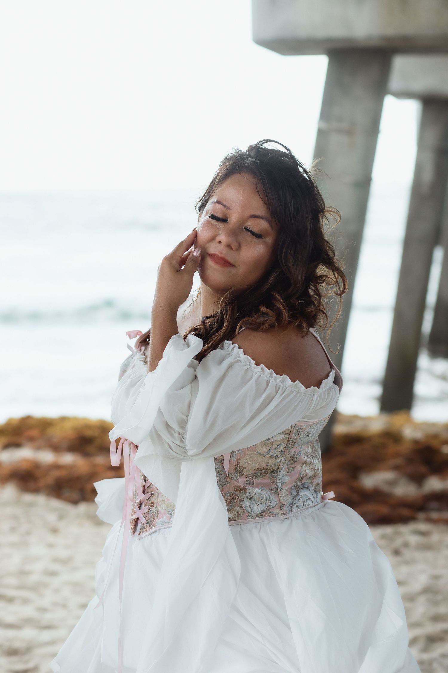 Fashion portrait of woman under the Pompano beach pier