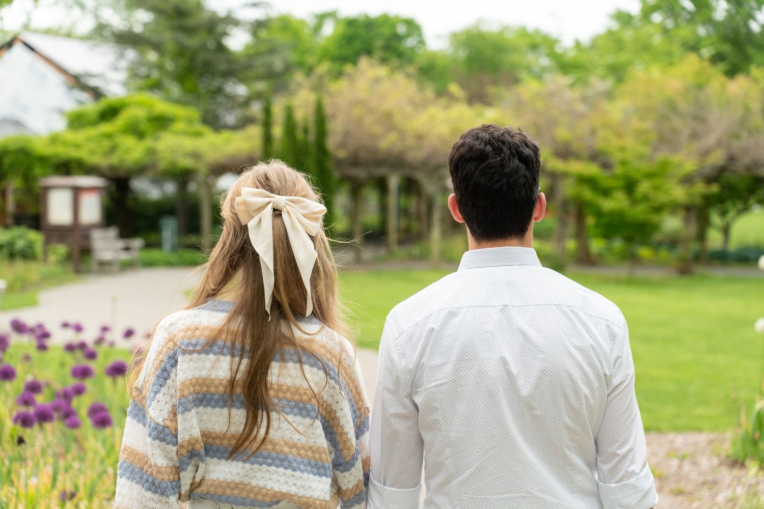 Engagement photo session in a spring garden.