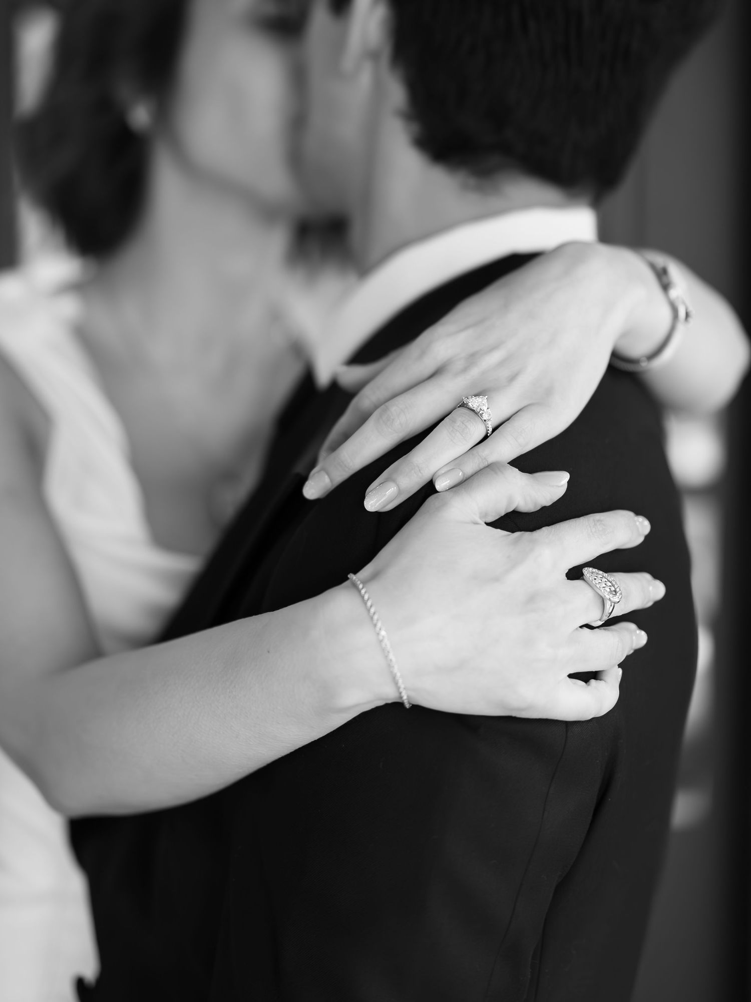 Close-up of bride’s hand and engagement rings during a Toronto engagement session