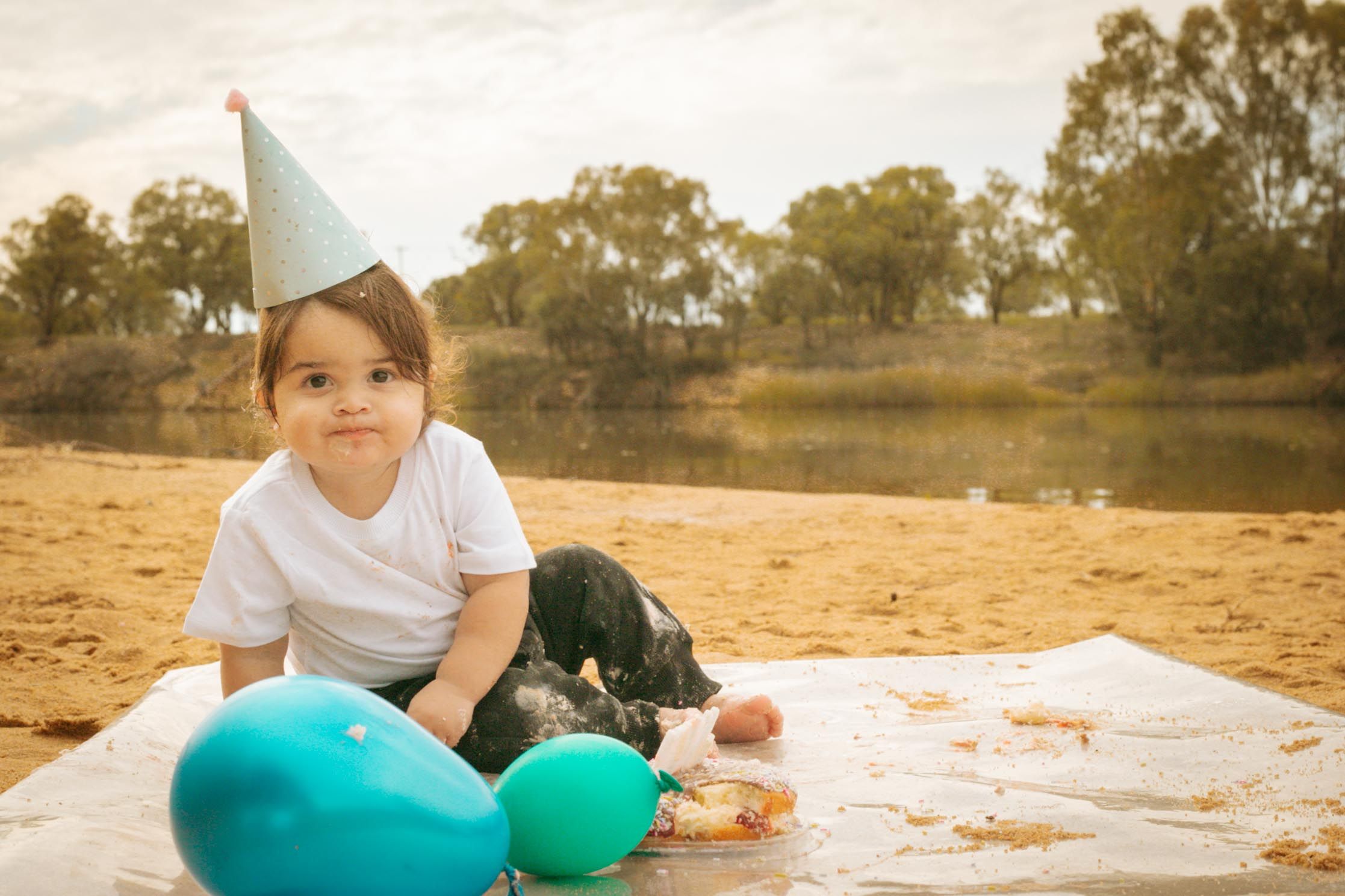 Mildura family photography at golden hour – natural outdoor portrait
First birthday cupcake smash Mildura