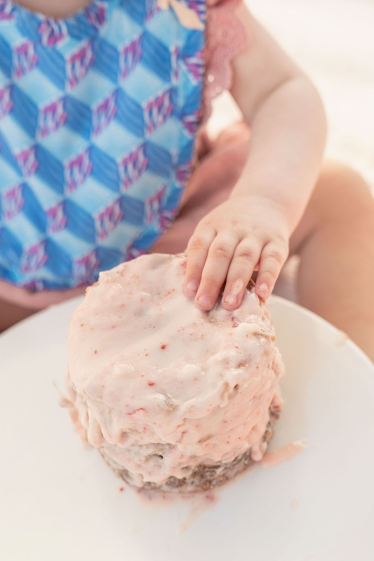 toddler girl cake smash one 1 year milestone outdoor photography, pink cake
