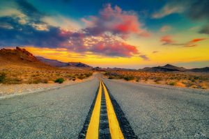 Route 66 sunset between Oatman and Topock, Arizona, showcasing Southwest destination imagery for travel, tourism, and branding.