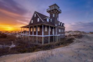 Historic Oregon Inlet Life-Saving Station at sunset on the Outer Banks, captured as fine art coastal photography.