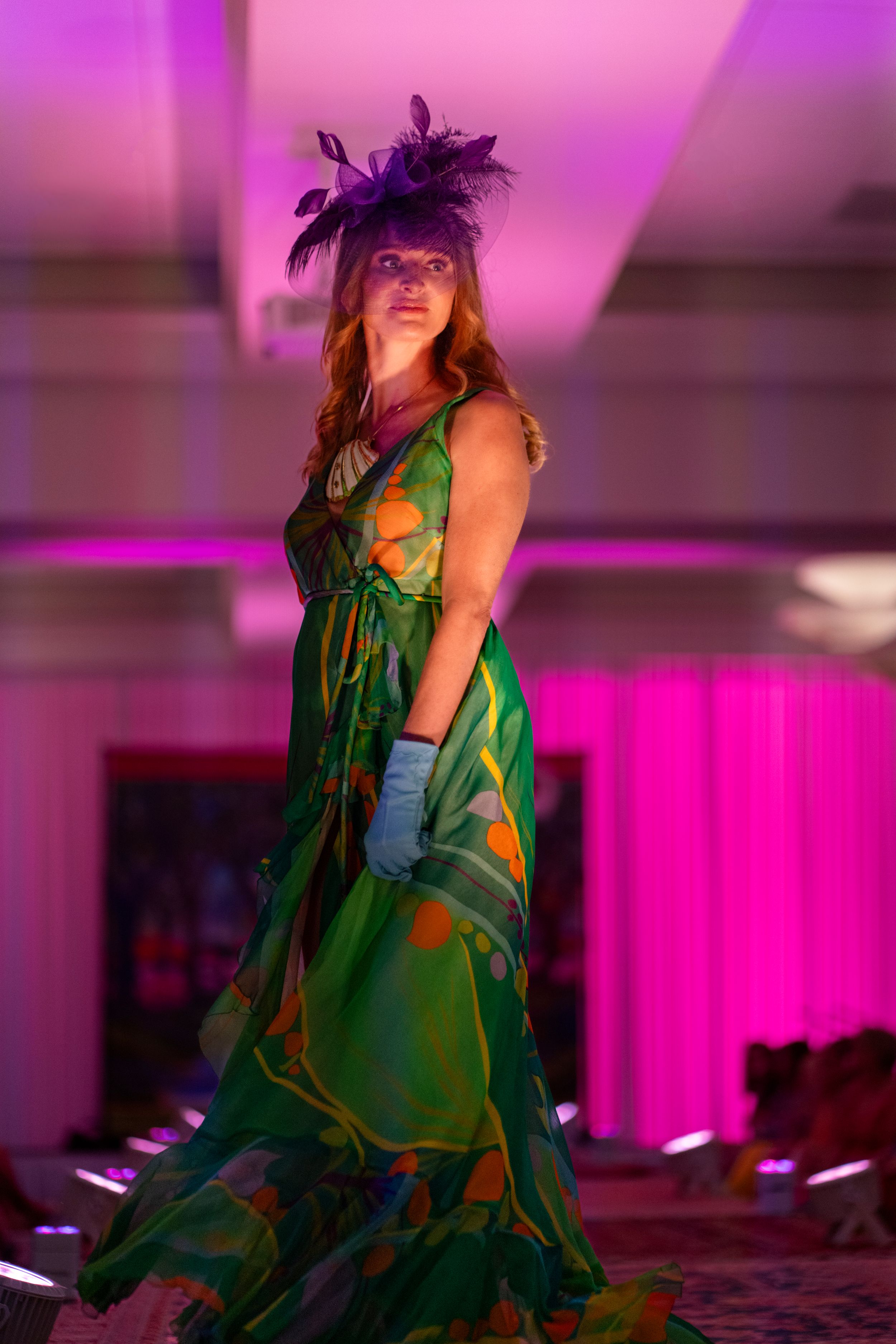 Model wearing Jess James+Co on the 2026 Azalea Festival Spring Fashion Show runway at Holiday Inn Resort Wrightsville Beach.