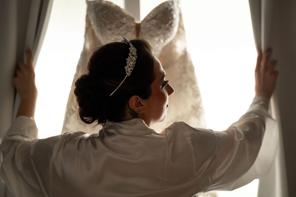 The bride and her wedding dress.