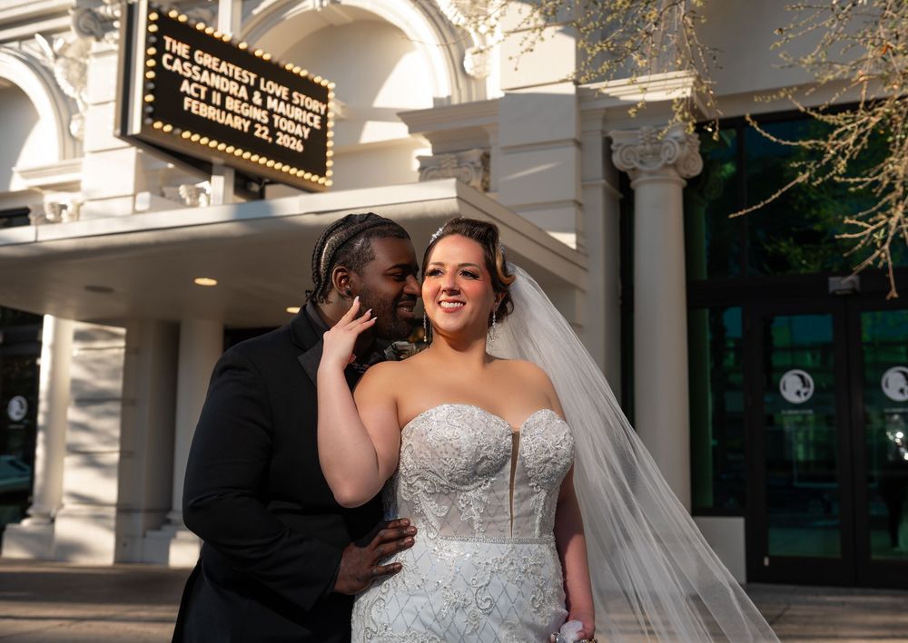 The bride and groom in front of their wedding venue, The Floridian in St. Petersburg, Florida.