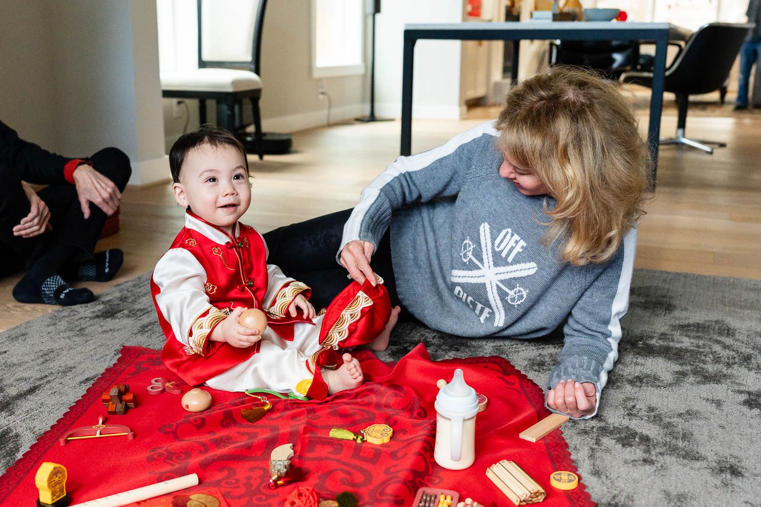 Baby playing with his toys.