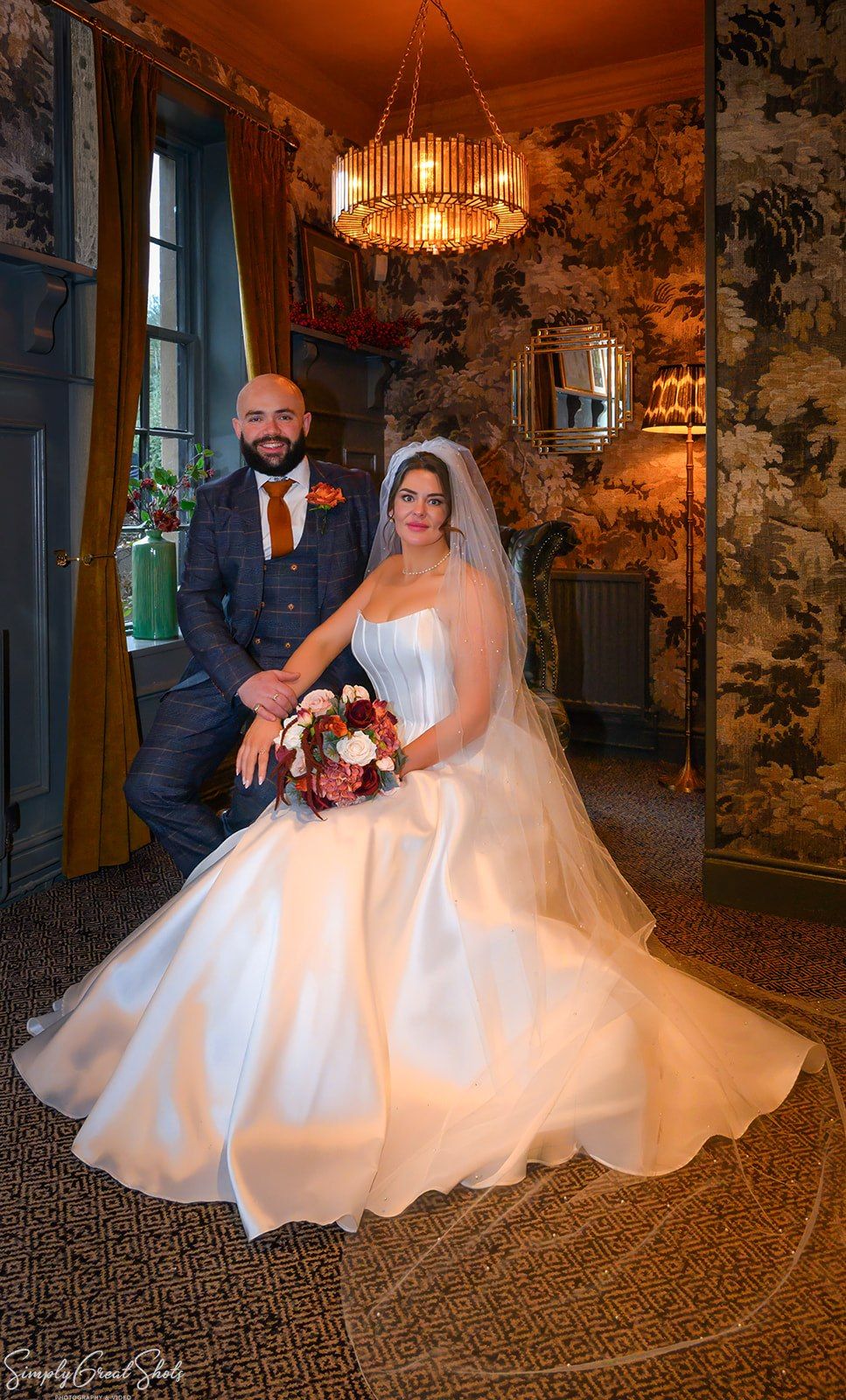 Wedding portrait of bride Stacey and groom Jack in the ornate interior of The Saxon Mill, Warwickshire. SimplyGreatShots Photography.