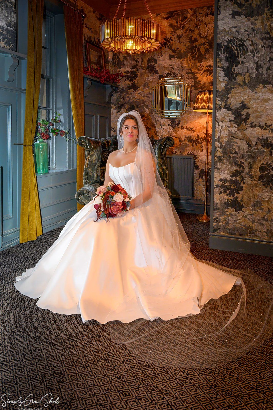 Solo bridal portrait of Stacey in her strapless gown and veil at The Saxon Mill, Warwickshire. SimplyGreatShots Photography.