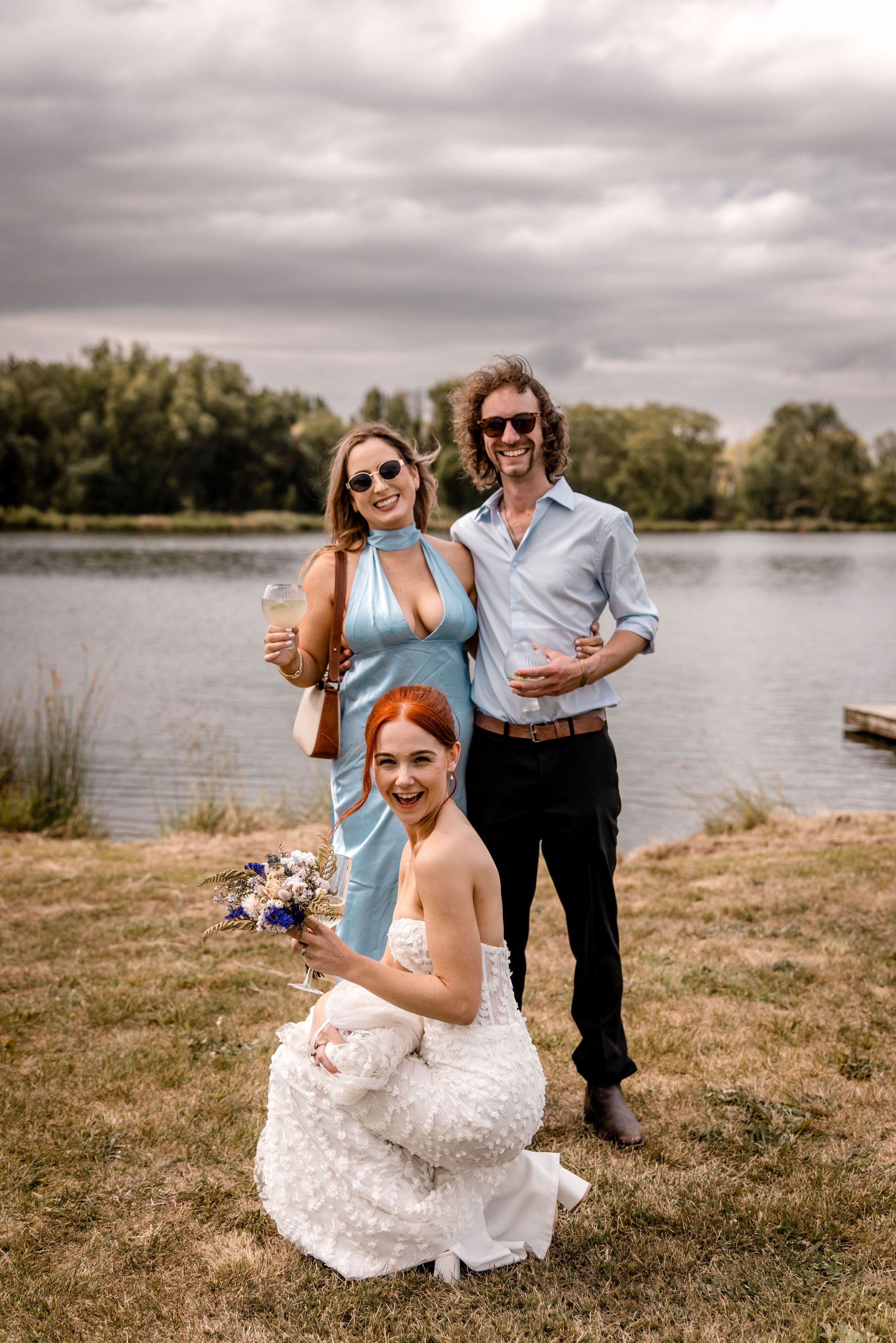 Bride and wedding guests posing