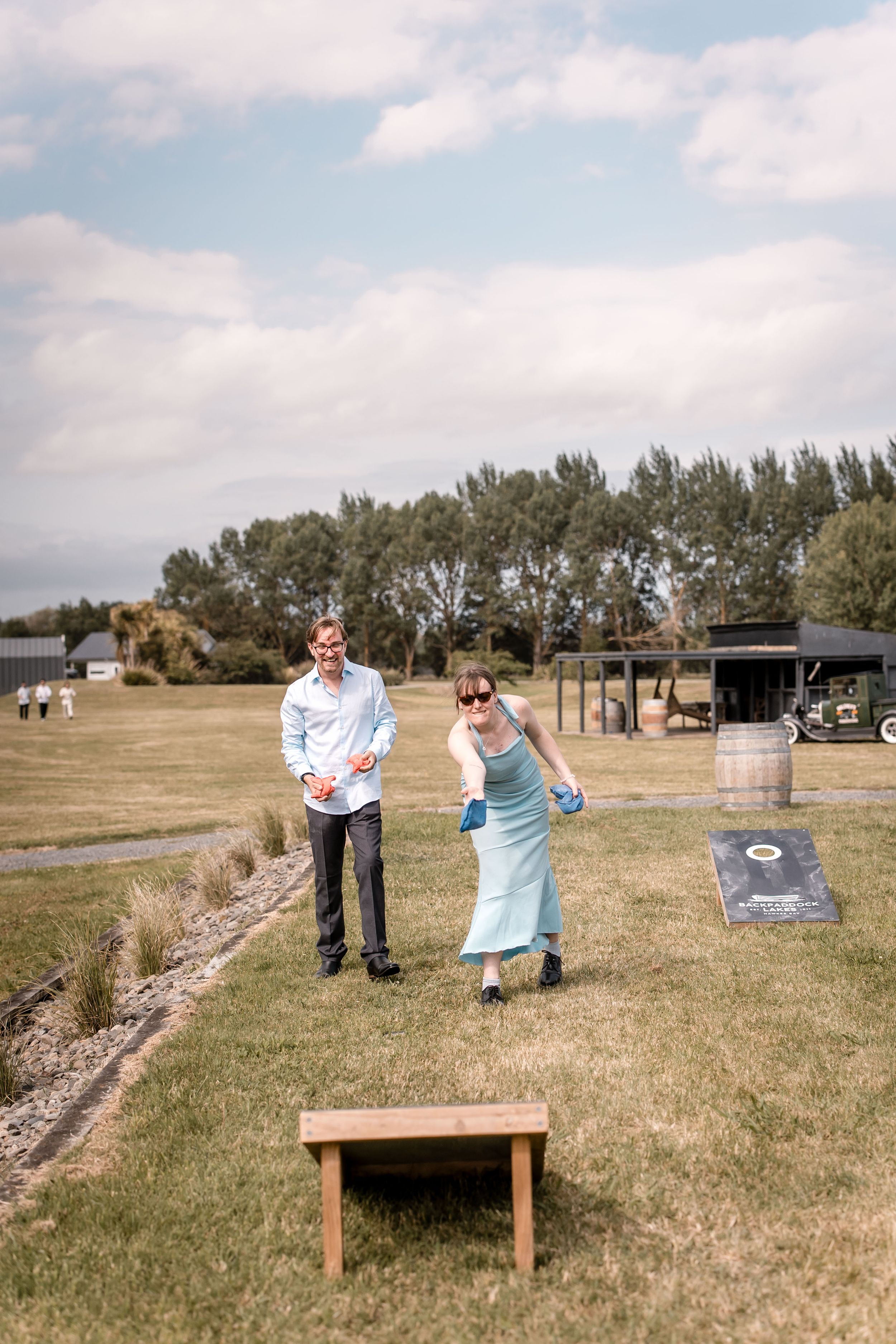 Wedding guests playing lawn games at Back Paddock Lakes