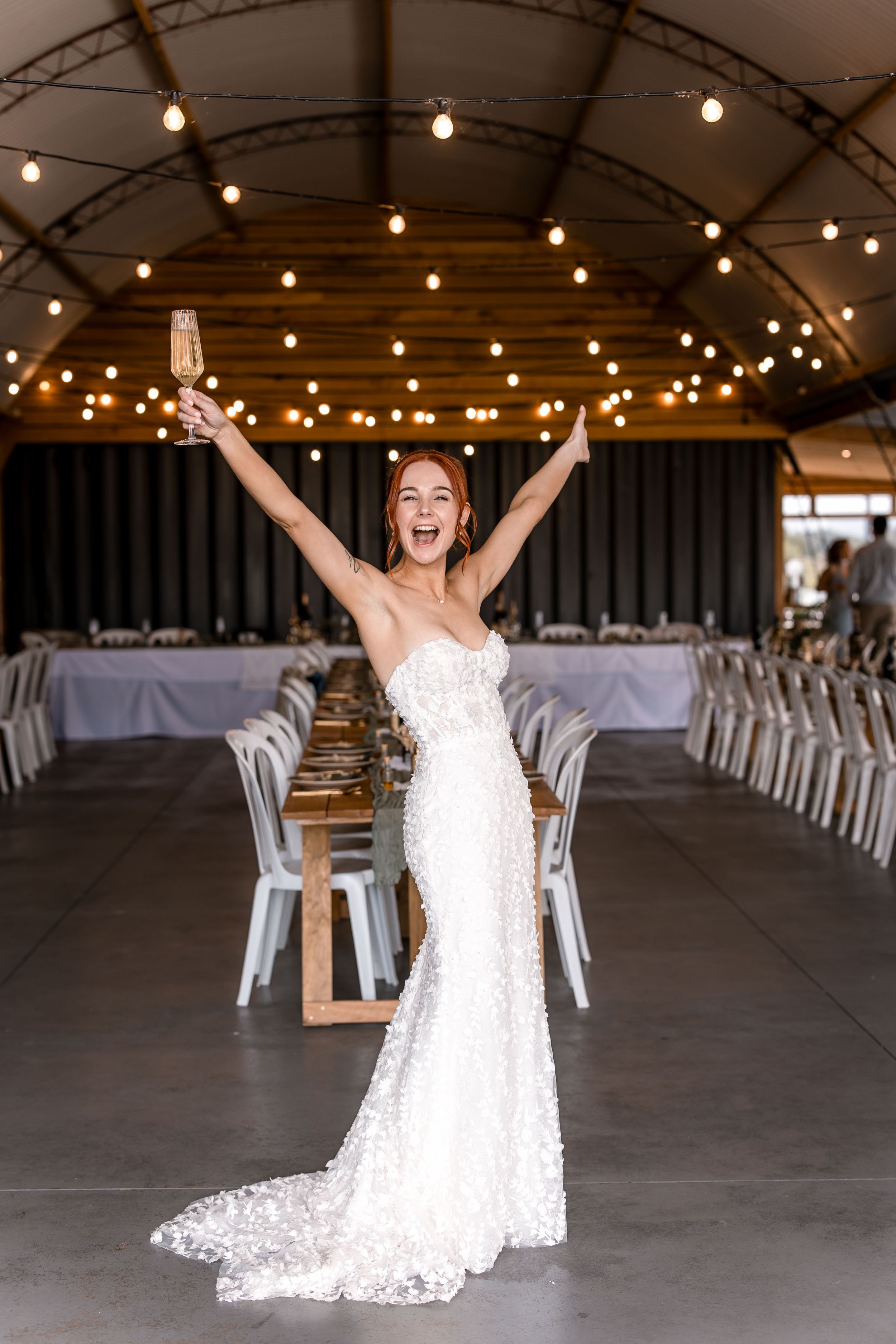 Bride looking excited and happy at Back Paddock Lakes