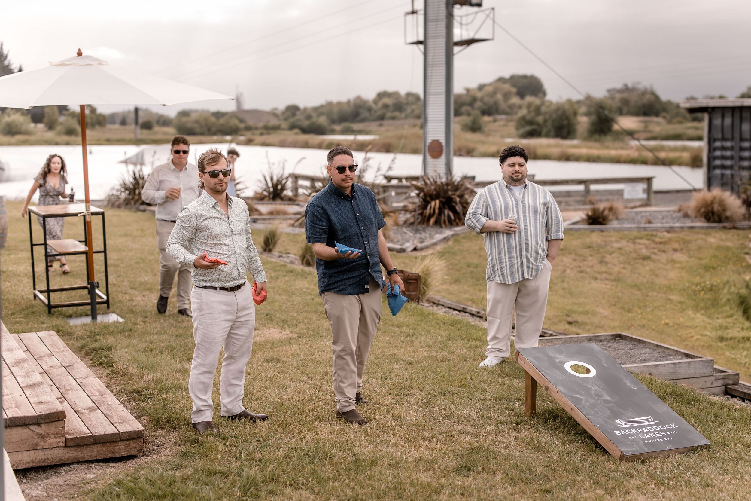 Guests playing lawn games at Back Paddock Lakes