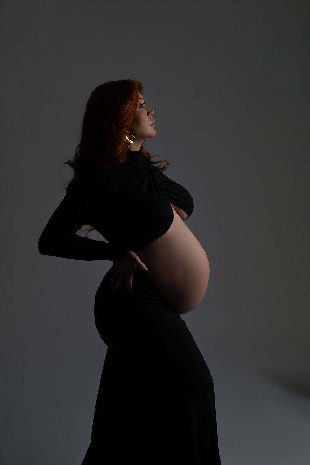 Elegant maternity studio photography session in New Jersey with neutral background
