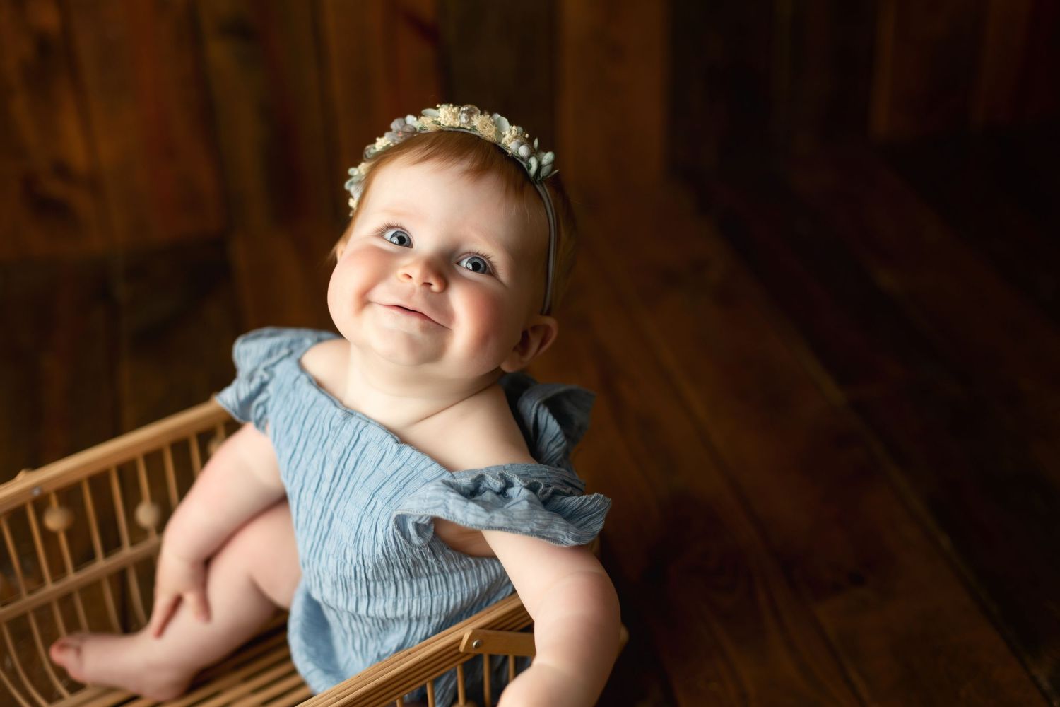 a baby in a basket looking up. Greenville sc newborn photographer, Easley sc newborn photographer, Upstate sc newborn photographer
