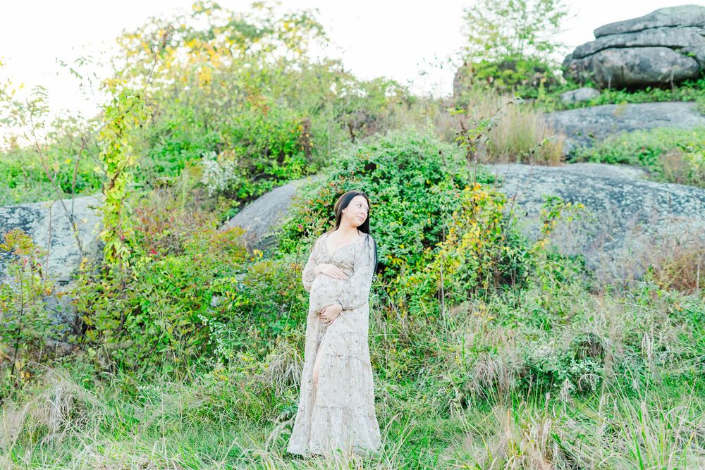 Maternity session mama looking over her shoulder