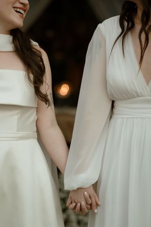 A collection of cropped photos showing details of white wedding dresses and smiling expressions in soft lighting.