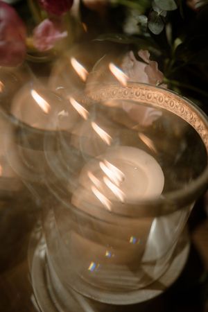 Artistic close-up of a teacup with swirling steam and light beams creating a dreamy atmospheric effect.