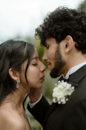 A romantic wedding couple sharing intimate close-up moments in a series of tender portraits.