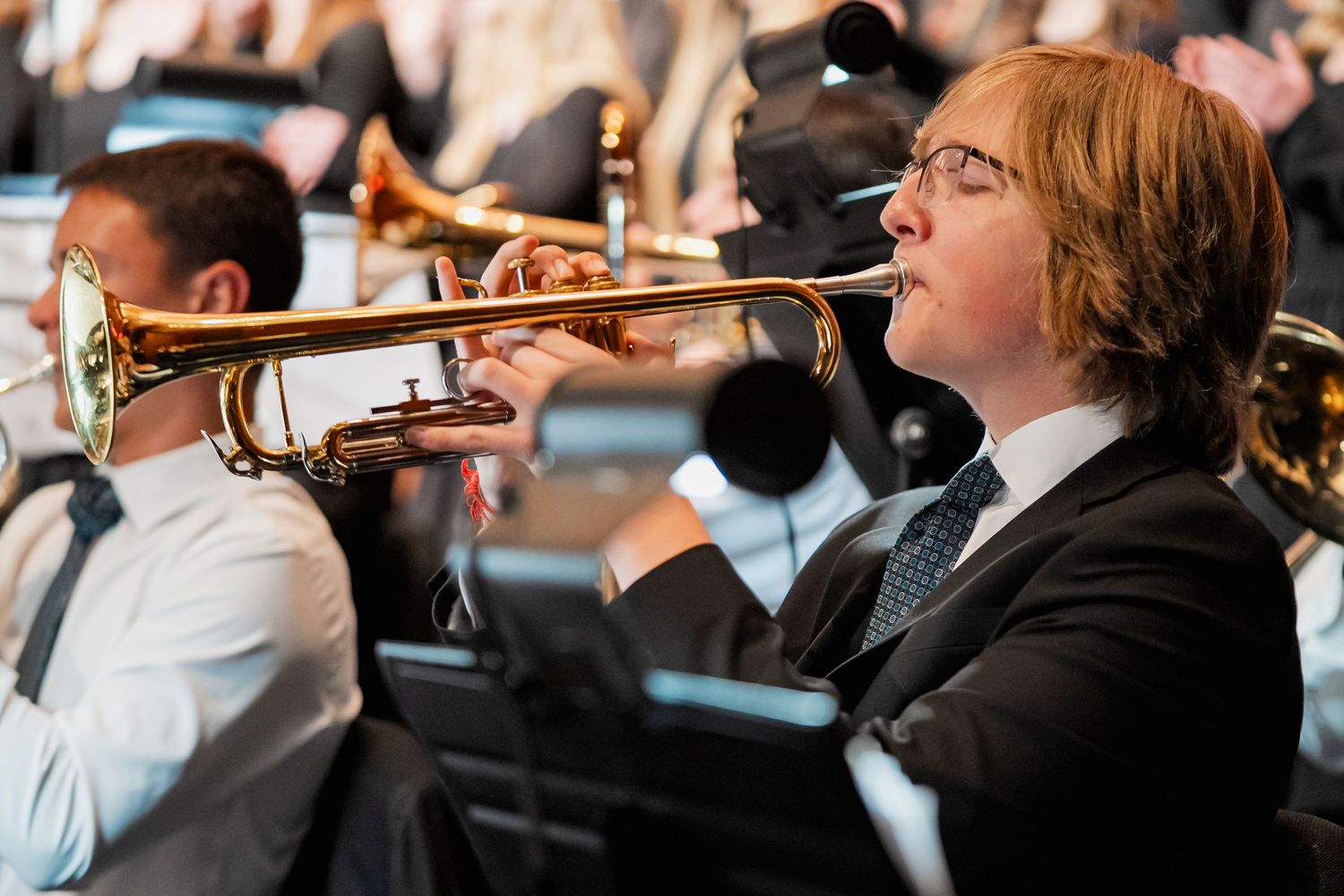 boy playing the trumpet