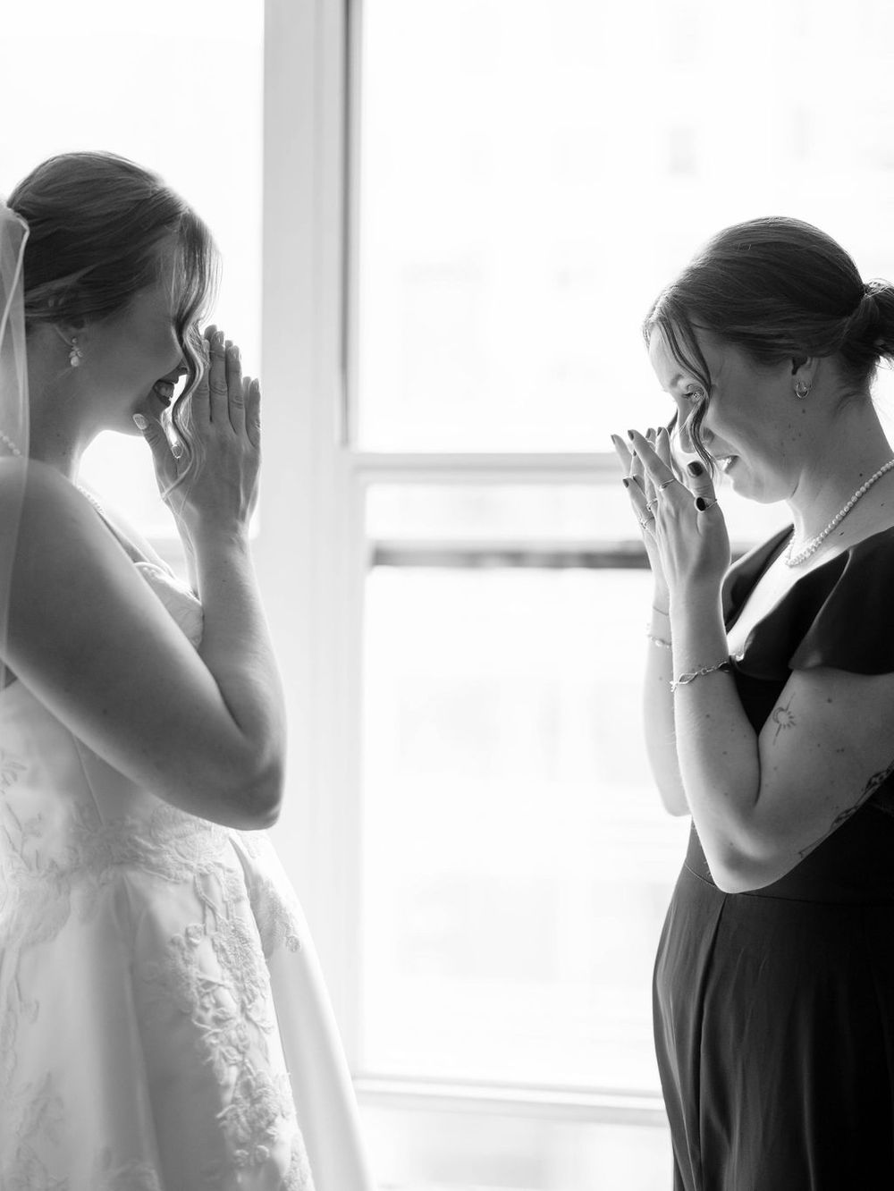 A black and white artistic photo sequence shows a person wiping their eyes while standing near a window.