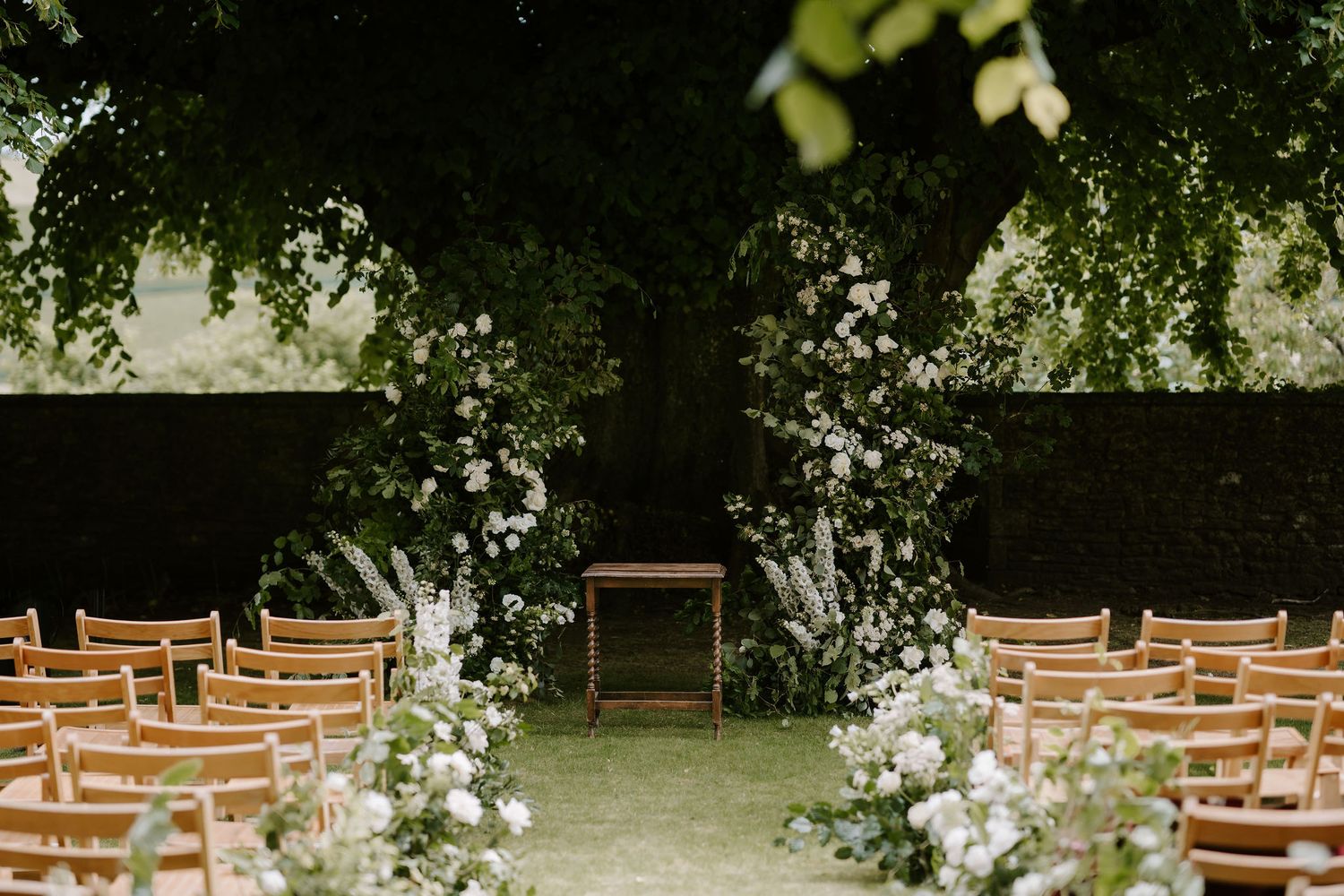 flower arrangements at outdoor ceremony at Hamswell house in bath