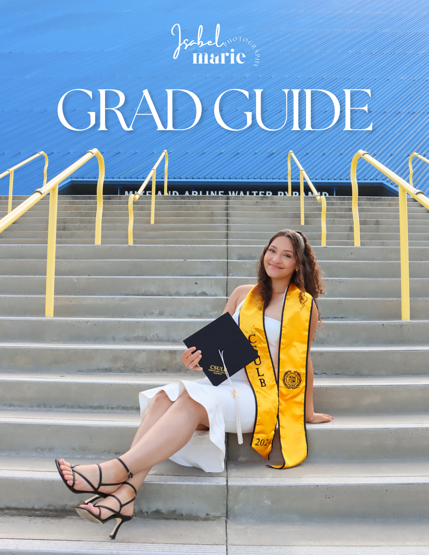 Graduate in black and gold stole poses on concrete steps for professional photos.