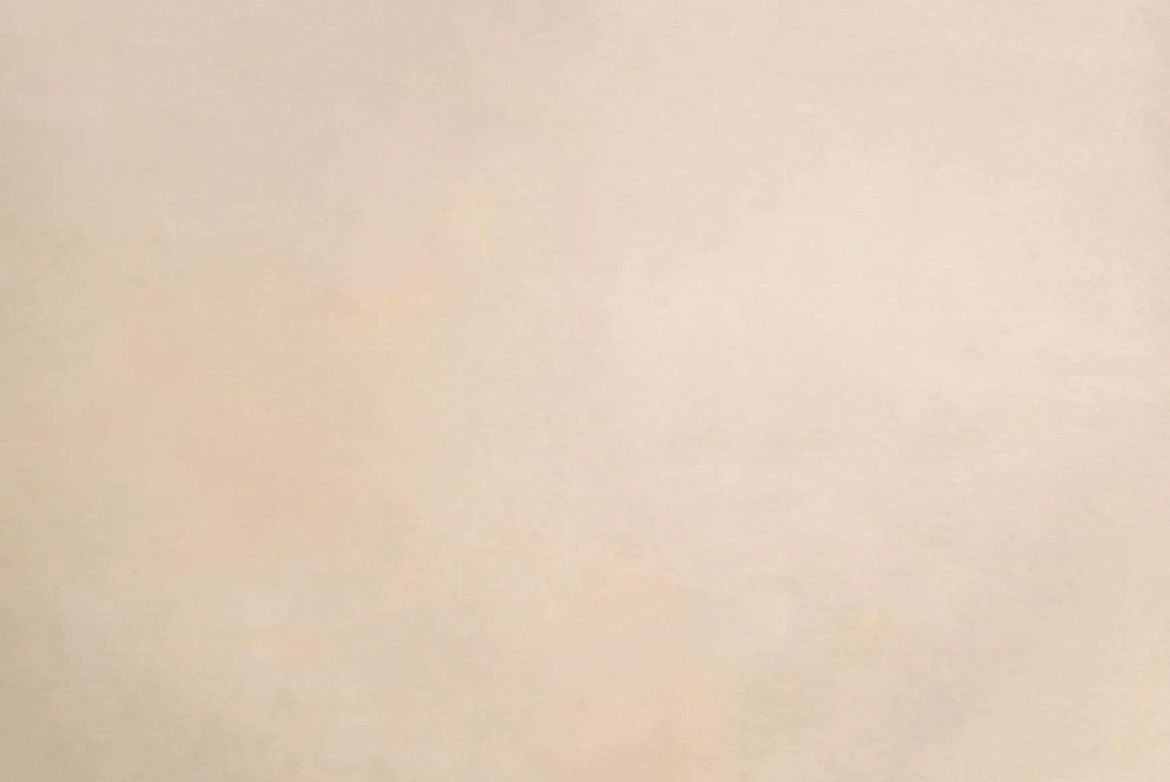 Smooth beige textured background with subtle gradient effect.