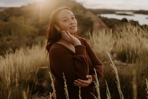 Natural outdoor portrait of Maria in soft natural light at lake moondarra, mount isa