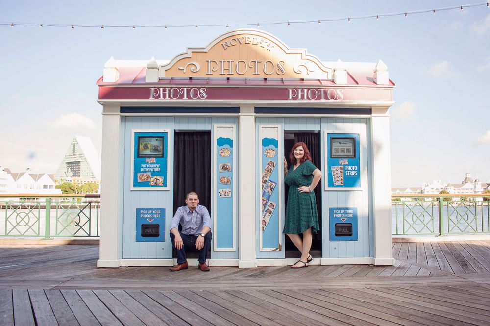 Fun photo booth Duo engagement portrait session at Disney's Boardwalk. Natural lighting soft and elegant