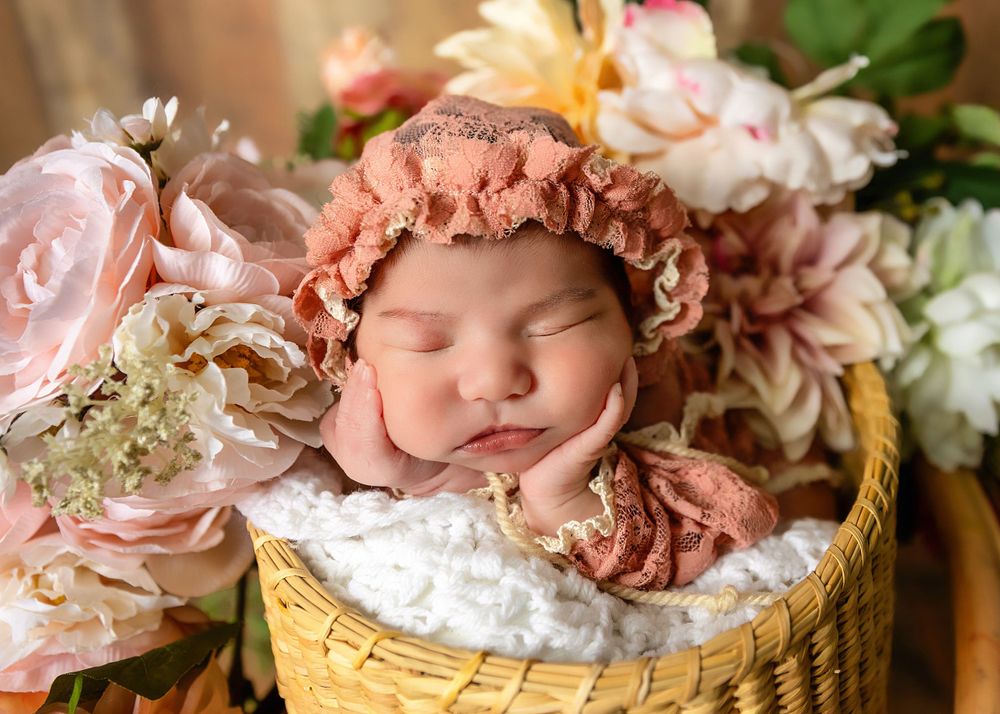 Professional newborn photography session with a baby girl in Clovis, CA