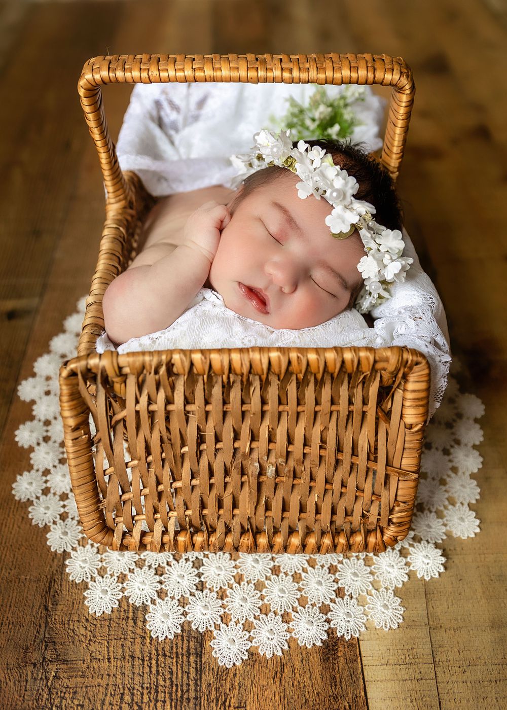 Professional newborn photography session with a baby girl in Fresno, CA