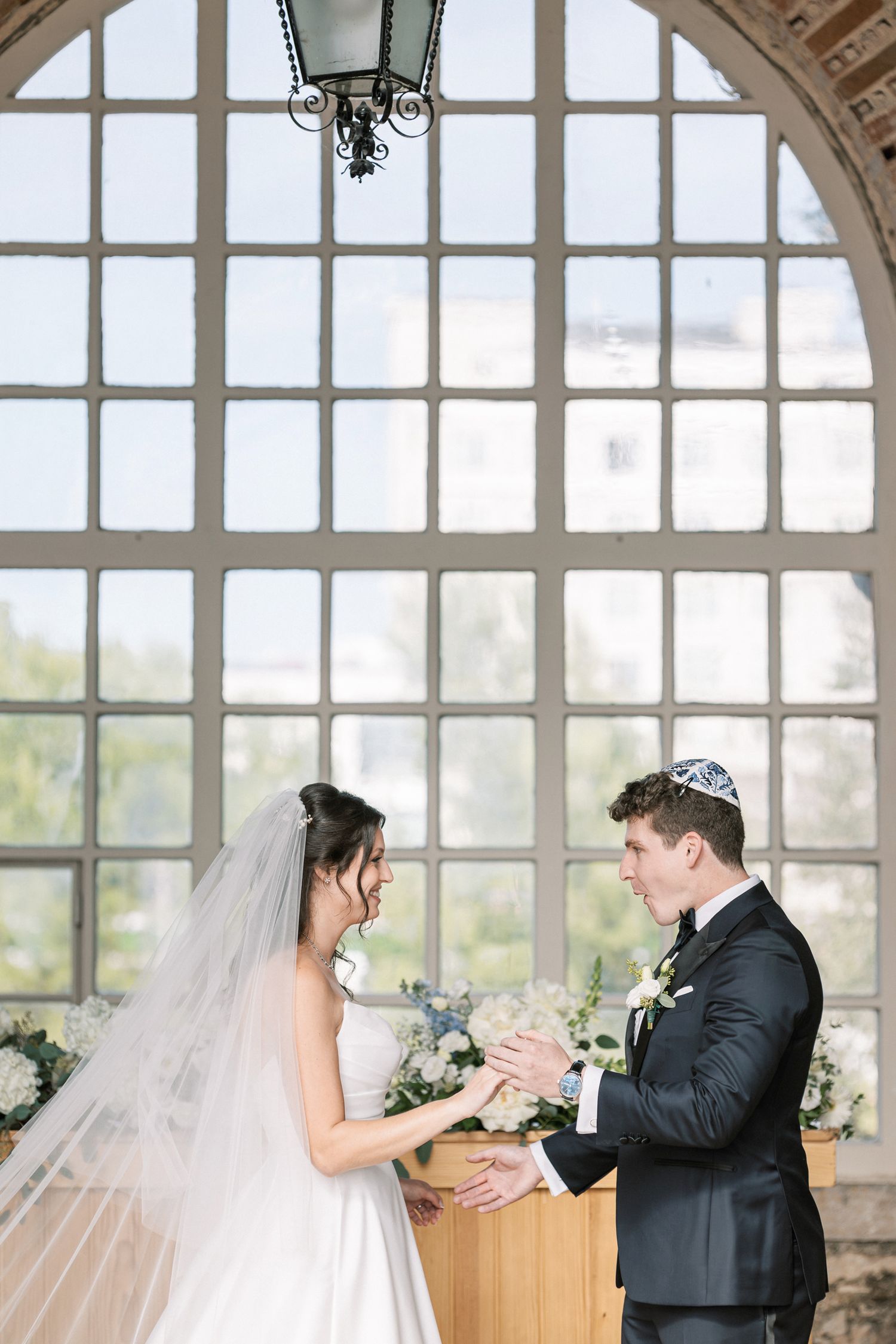 Emotional first look at Forte da Cruz between bride and groom before Jewish wedding ceremony