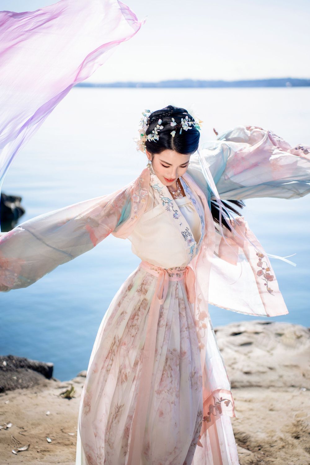 Beautiful seaside Hanfu dance portrait featuring flowing traditional clothing at Point Chevalier, by an Auckland photographer.