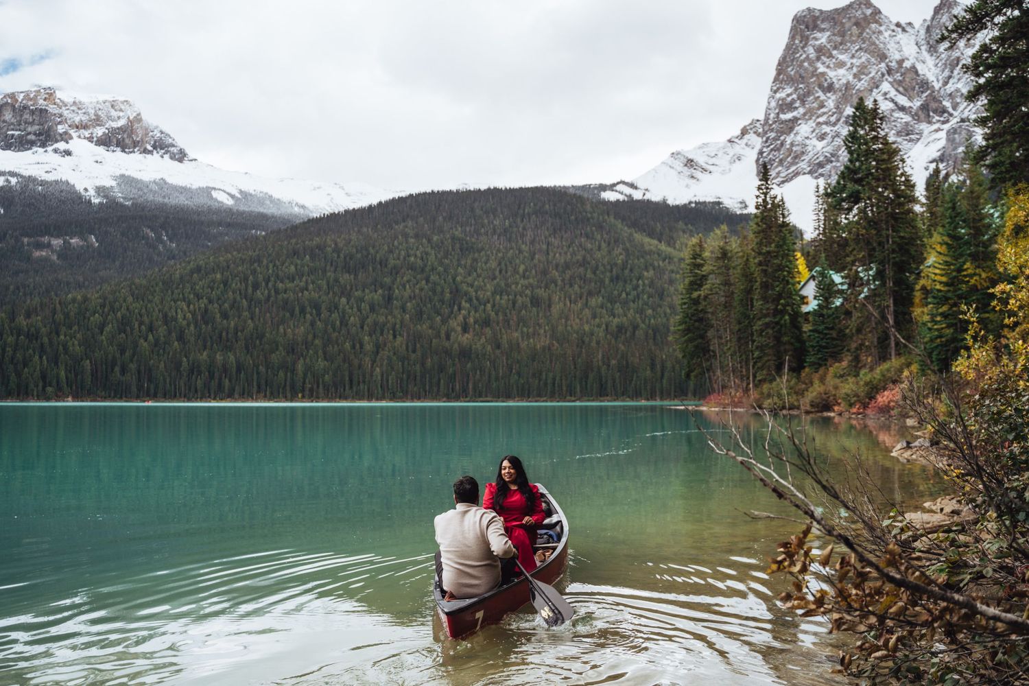 Couple in a canoe on Emerald Lake. Rockies engagement photo.
