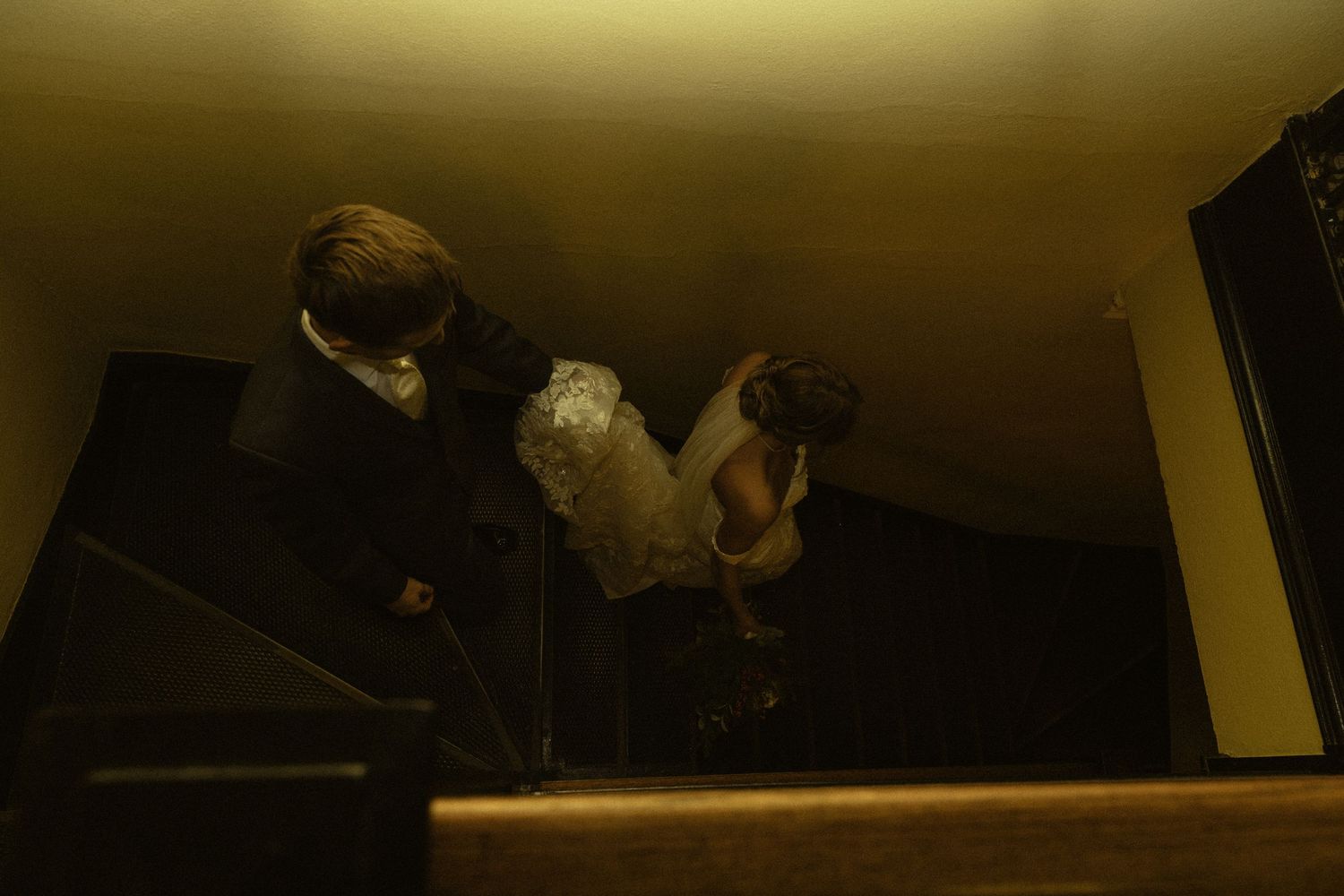 A dark atmospheric interior space with ambient lighting.