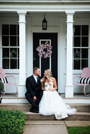 Wedding photos showing a couple sitting on a porch bench at different moments during their special day at Liberty House in Waterville, Ohio.