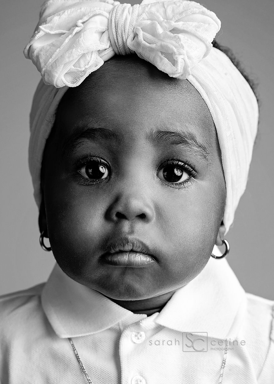 A black and white artistic photo series showing five close-up portraits with white head wraps.